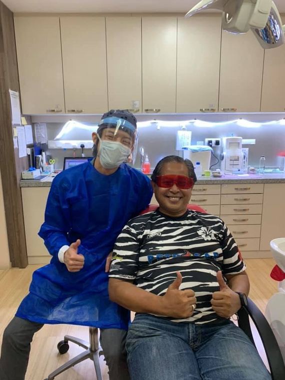 Dr. Arthur with a happy patient at iCare Dental IOI City Mall Putrajaya