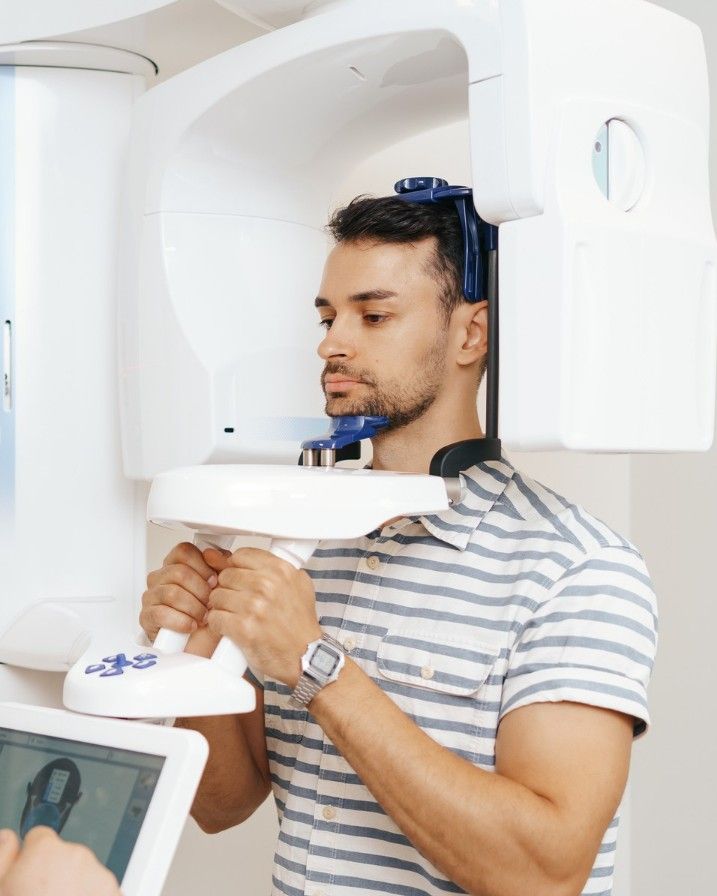 Patient having a CBCT scan taken at iCare Dental IOI City Mall Putrajaya